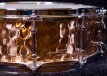 ...and the Bronze goes to...Could be YOU! Here's the first Hammered Bronze TreeHouse snare, featuring Chrome hardware. 5x14; hammered bronze. To see more pix, and search our entire TreeHouse archive for your favorite specs, visit our photo gallery: http://www.flickr.com/photos/treehousedrums/collections/